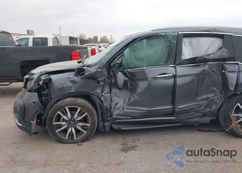 2021 Honda Pilot Awd Elite z USA, uszkodzony, nr VIN 5FNYF6H05MB002312